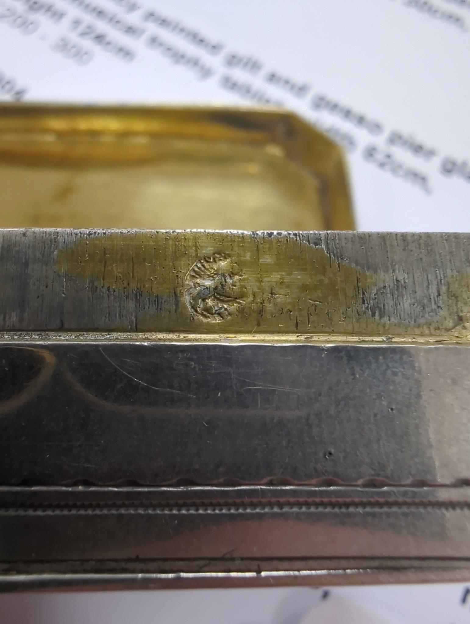 An early 19th century Dutch? engraved white metal rectangular snuff box, with canted corners, 84mm, 103 grams.